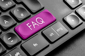 Purple FAQ key on computer keyboard