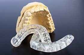 Model smile and TMJ oral appliance