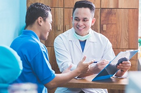 Patient talking to dentist