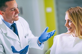 Dentist and patient discussing payment options for braces