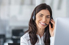 Friendly receptionist wearing a headset