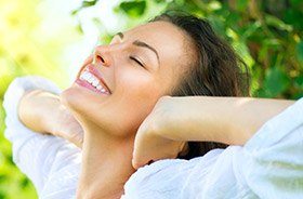 Smiling woman outdoors