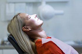 Relaxed woman in dental chair