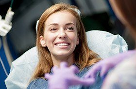 Smiling woman in dental chair