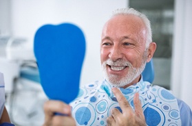 dental patient admiring teeth