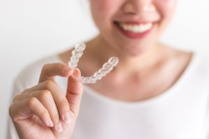 Holding aligner, fixing TMJ with Invisalign in Torrington