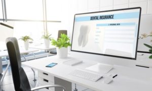 Dental insurance information on large computer monitor