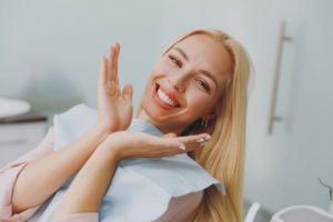 Happy dental patient showing off her smile