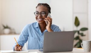 Woman with braces working at her desk 