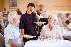 Senior couple preparing to eat in a restaurant 